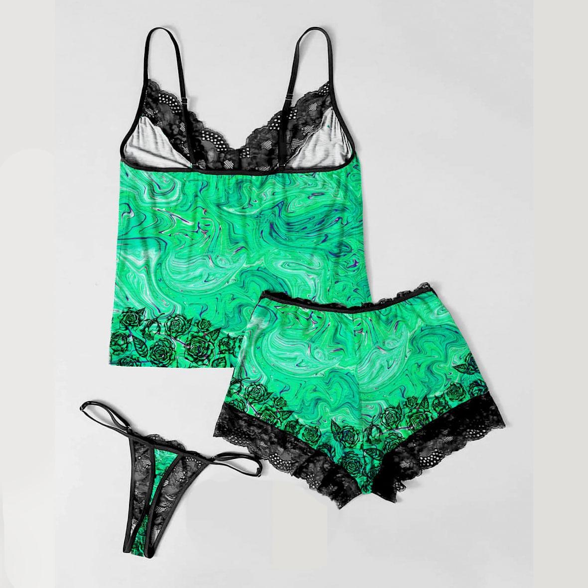 Stay stylish and comfortable with the Wonder Skull Women's Pajama Set. Featuring bold skull and rose prints, neon green accents, and soft lace details, this lightweight, breathable 3-piece set blends gothic style with ultimate comfort—perfect for lounging or sleeping.