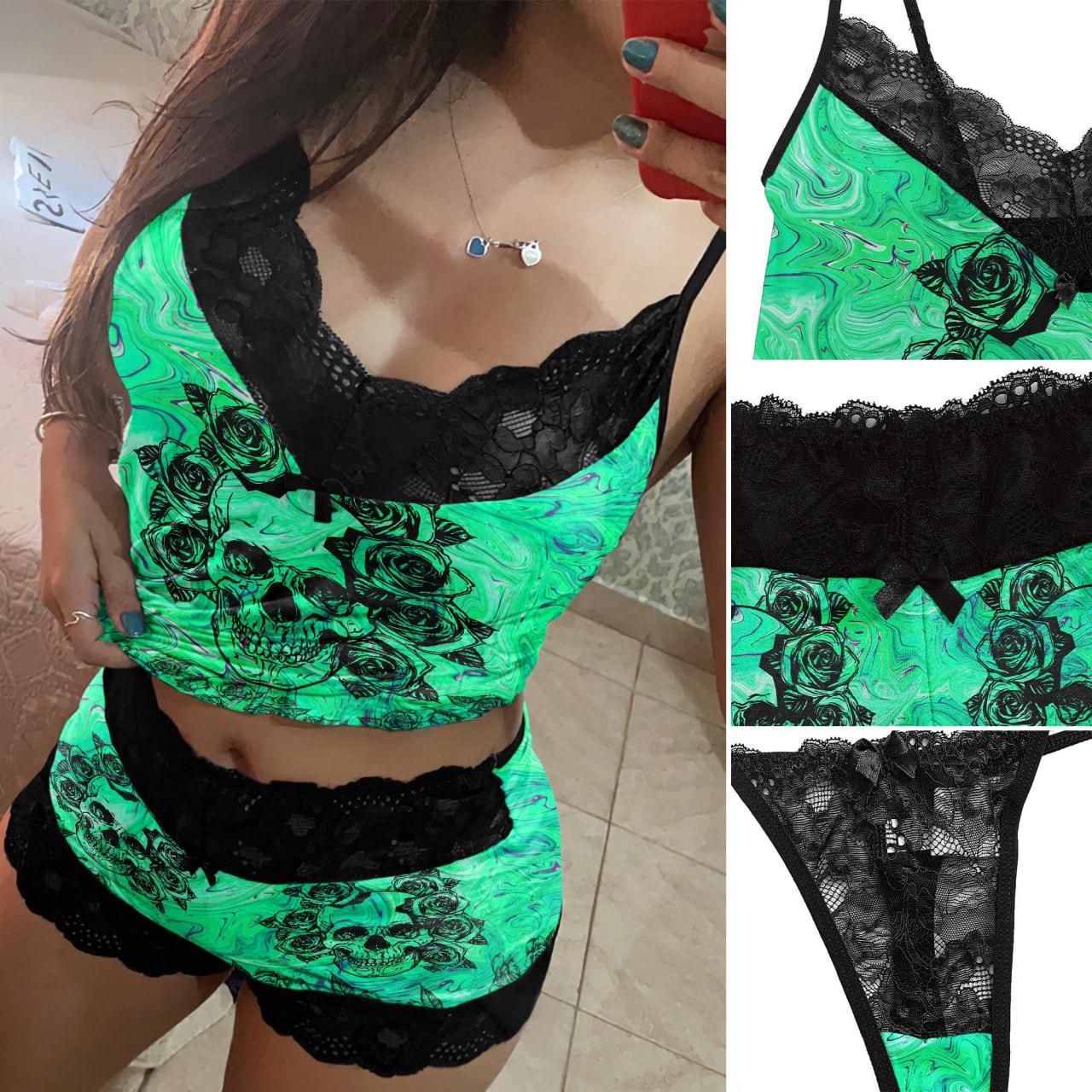 Stay stylish and comfortable with the Wonder Skull Women's Pajama Set. Featuring bold skull and rose prints, neon green accents, and soft lace details, this lightweight, breathable 3-piece set blends gothic style with ultimate comfort—perfect for lounging or sleeping.