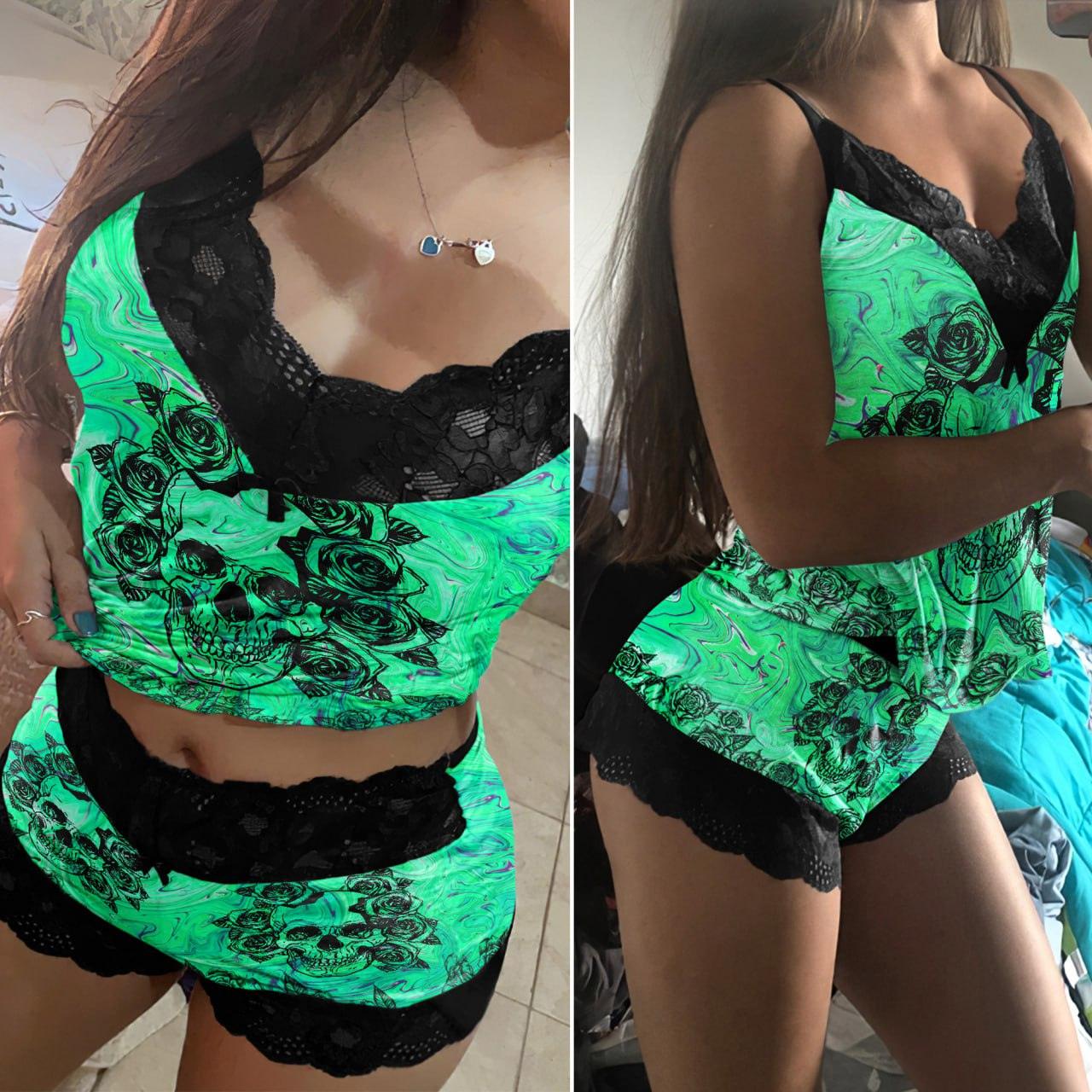 Stay stylish and comfortable with the Wonder Skull Women's Pajama Set. Featuring bold skull and rose prints, neon green accents, and soft lace details, this lightweight, breathable 3-piece set blends gothic style with ultimate comfort—perfect for lounging or sleeping.