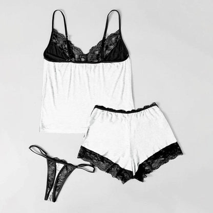  Wonder Skull "Unique Iconic Printing" Sleepwear Set features playful skull designs and elegant lace details for a whimsical yet sophisticated look. Made from high-quality materials, it offers comfort and durability, perfect for lounging and sleeping. This stylish set is a must-have for a unique nighttime wardrobe.