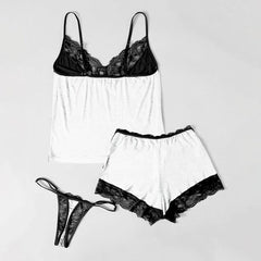  Wonder Skull "Little Nightmare" Sleepwear Set features playful skull designs and elegant lace details for a whimsical yet sophisticated look. Made from high-quality materials, it offers comfort and durability, perfect for lounging and sleeping. This stylish set is a must-have for a unique nighttime wardrobe.