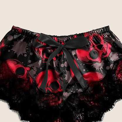 Wonder Skull sleepwear set combines comfort and bold style. The black floral lace trim on the cami and shorts feels soft on your skin, while lightweight, breathable fabric keeps you cool all night. Adjustable straps ensure a perfect fit, and the red skull print adds an edgy, confident touch.
