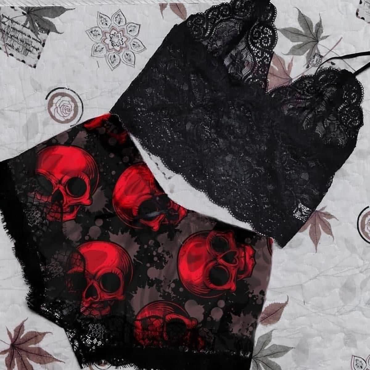 Wonder Skull sleepwear set combines comfort and bold style. The black floral lace trim on the cami and shorts feels soft on your skin, while lightweight, breathable fabric keeps you cool all night. Adjustable straps ensure a perfect fit, and the red skull print adds an edgy, confident touch.