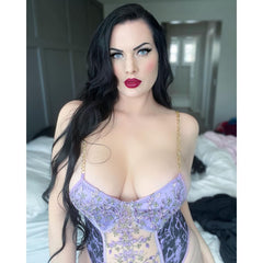 Wonder Skull Women's Purple Lace Lingerie is a stylish one-piece bodysuit with a luxurious design, customizable fit, built-in bust support, and detachable garter straps. Perfect for adding elegance and confidence to your lingerie collection.