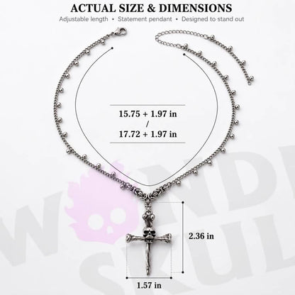 Wonder Skull gothic day collar features a bold skull-and-crossbones pendant on a delicate chain with sphere accents. With adjustable length options and a lobster clasp, it offers both style and practicality. Perfect for discreet D/s symbolism and alternative fashion, this silver-tone necklace is designed to sit close and make a statement.