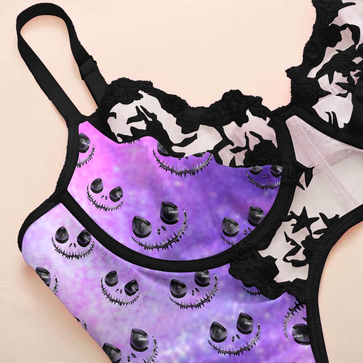 Wonder Skull Wicked Wink Lace Garter Bodysuit combines edgy style with comfort. Featuring a bold skull pattern, shimmering violet color, embroidered cups, and adjustable garters, this curve-flattering lingerie is perfect for lounging or showing off. Add a daring touch to your collection with this stylish, sultry piece.