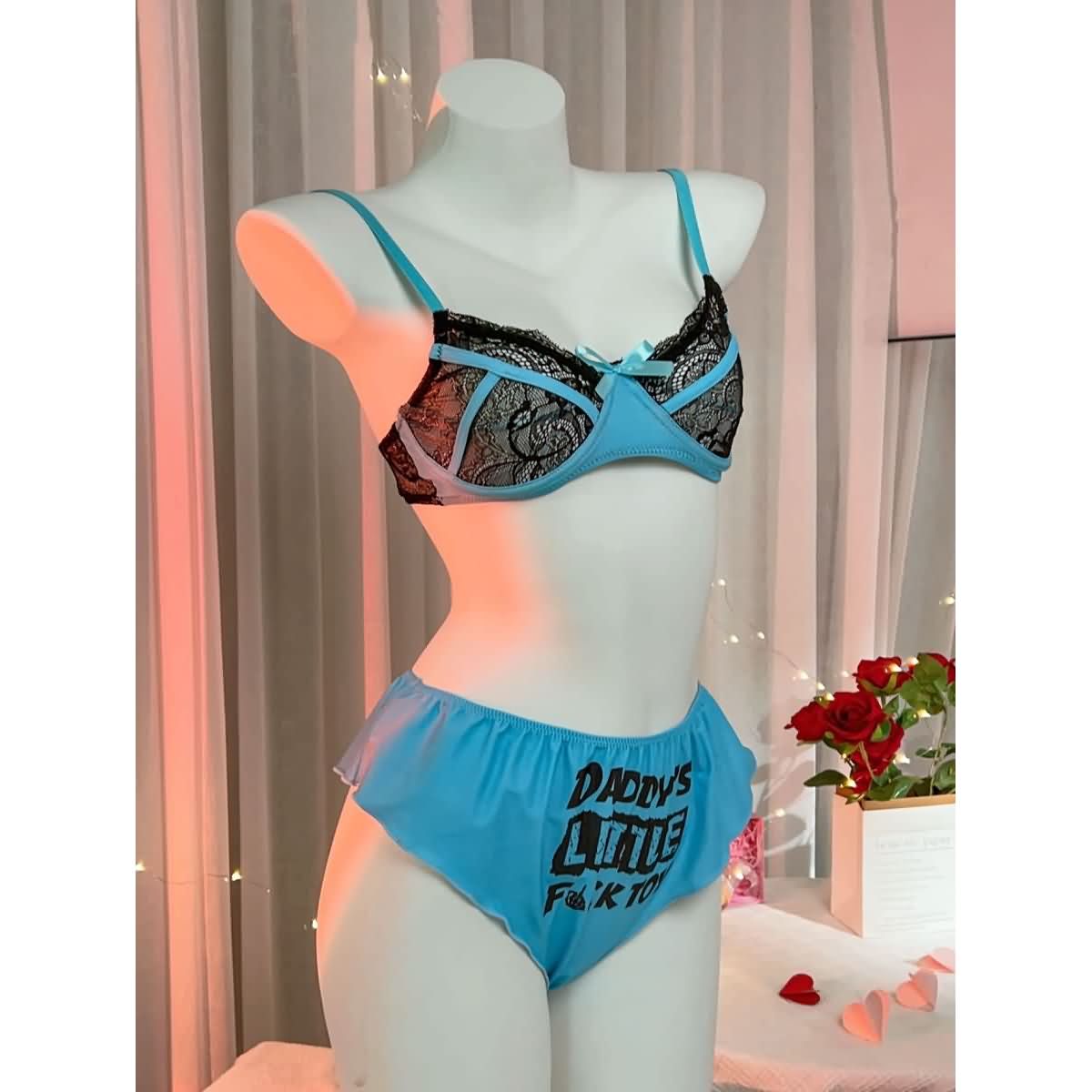 Wonder Skull's Contrast Lace Bra and Panty Set with a playful 'Daddy's Little F Toy' print for a bold and unique touch.