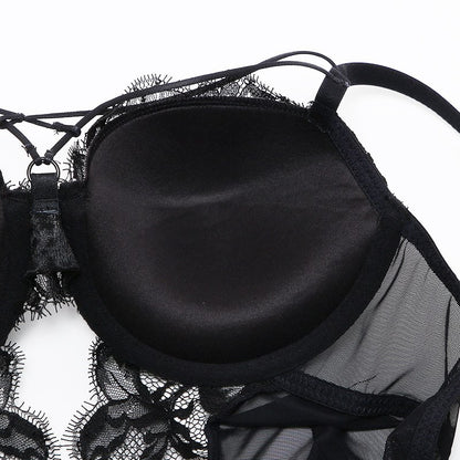 Welcome to the world of allure and elegance with the Nightmare Bandage Women's Bodysuit Sexy Hollow Lace Push Up. 