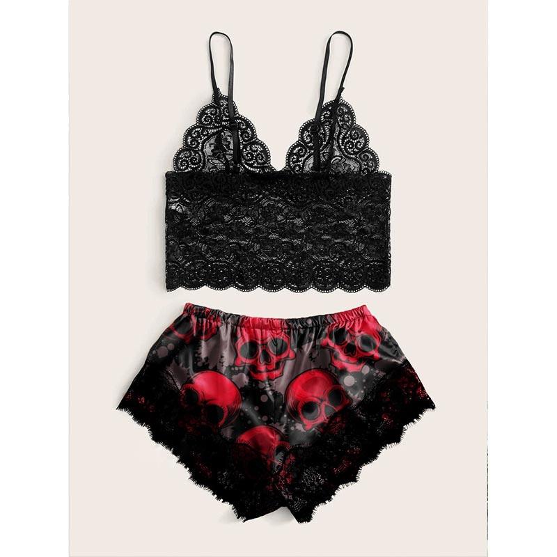 Wonder Skull Women's Pajama Set combines edgy punk style with comfort, featuring glow-in-the-dark skull designs and lace accents. Perfect for lounging or sleeping, it's ideal for fans of goth and punk-inspired fashion.