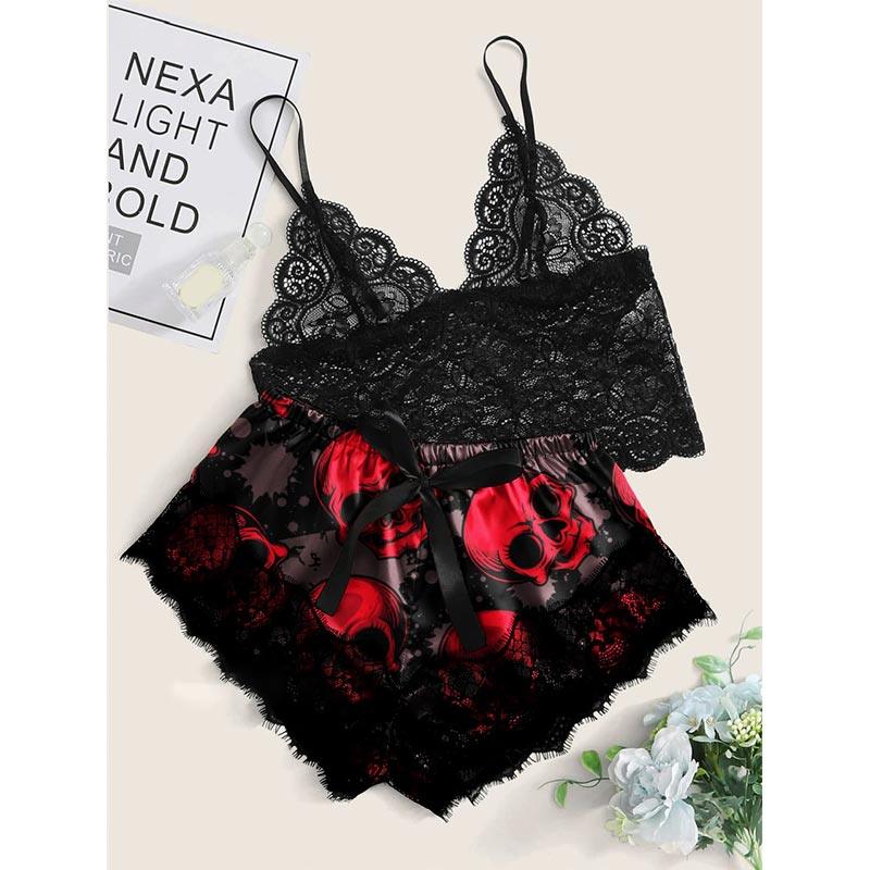 Wonder Skull Women's Pajama Set combines edgy punk style with comfort, featuring glow-in-the-dark skull designs and lace accents. Perfect for lounging or sleeping, it's ideal for fans of goth and punk-inspired fashion.